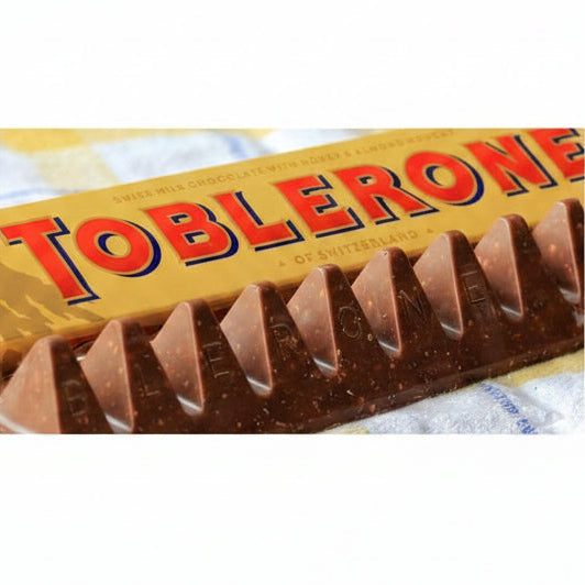Toblerone Milk Chocolate with Honey and Almond Nougat 100g